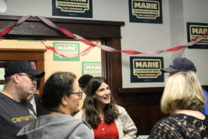 U.S. Rep. Marie Gluesenkamp Perez, D-Skamania, center, chats with supporters May 17 during a campaign volunteer event in Vancouver. She is seeking a third term, but faces challengers from the left, right and center. (Taylor Balkom/The Columbian)