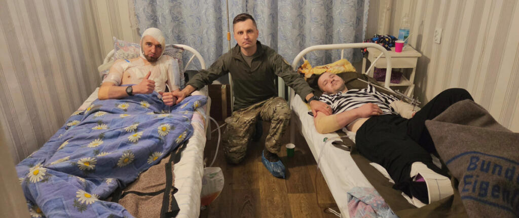 Vancouver&rsquo;s Mikhail Pavenko, center, visits wounded Ukrainian soldiers at a secret medical &ldquo;stabilization point&rdquo; in the Donbas region of eastern Ukraine. (Contributed by Mikhail Pavenko)