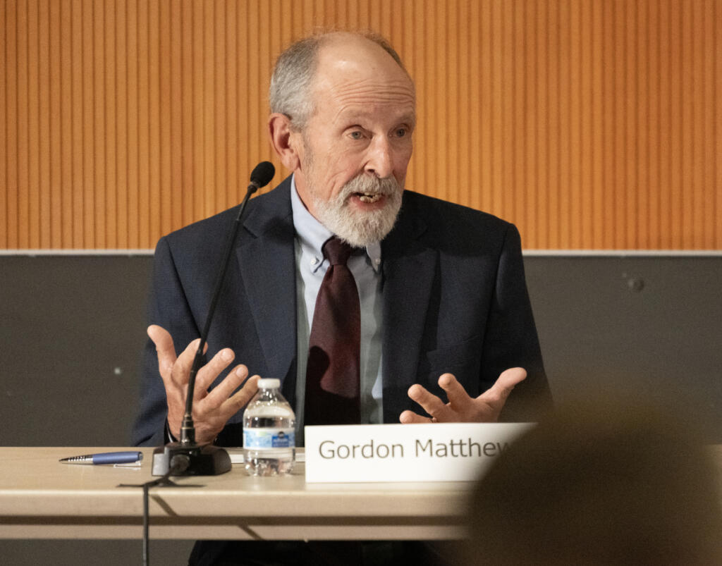 Clark Public Utilities Board of Commissioners candidate Gordon Matthews speaks Thursday during a League of Women Voters forum at Vancouver Community Library.
