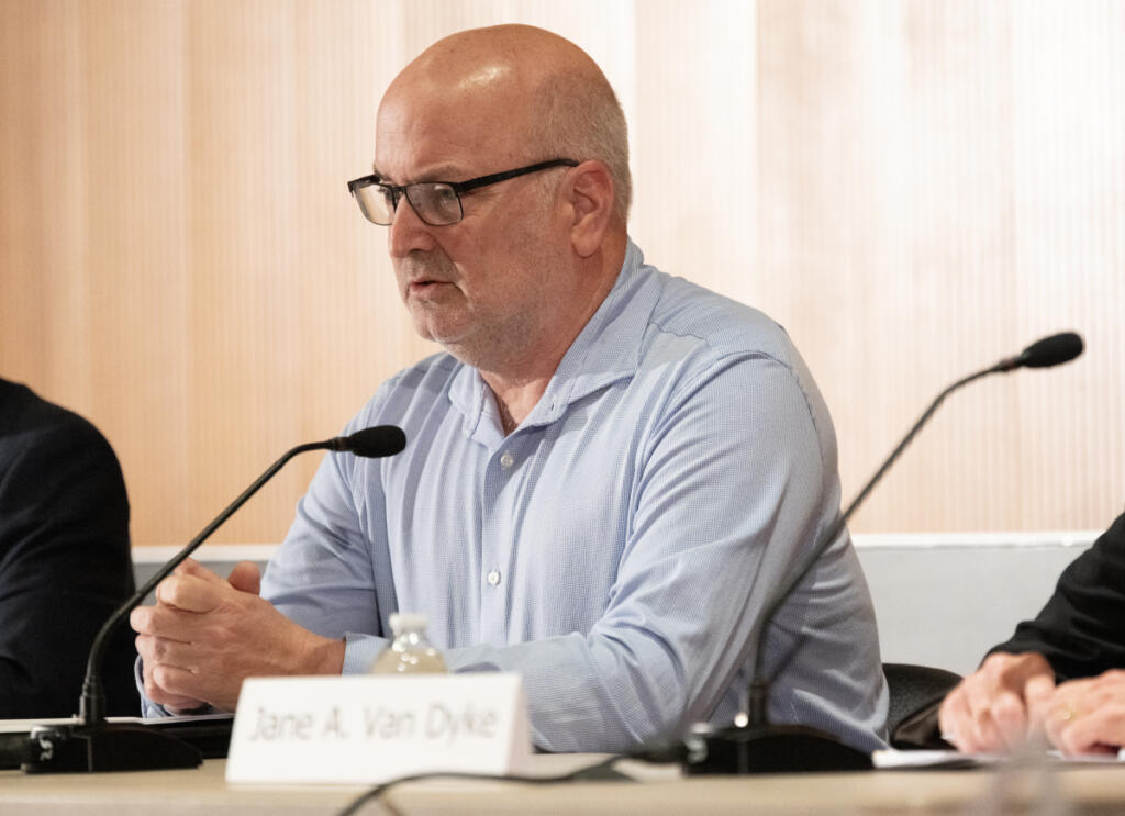 Clark Public Utilities Board of Commissioners candidate Kevin Roegner speaks Thursday during a League of Women Voters forum at Vancouver Community Library. (Taylor Balkom/The Columbian)