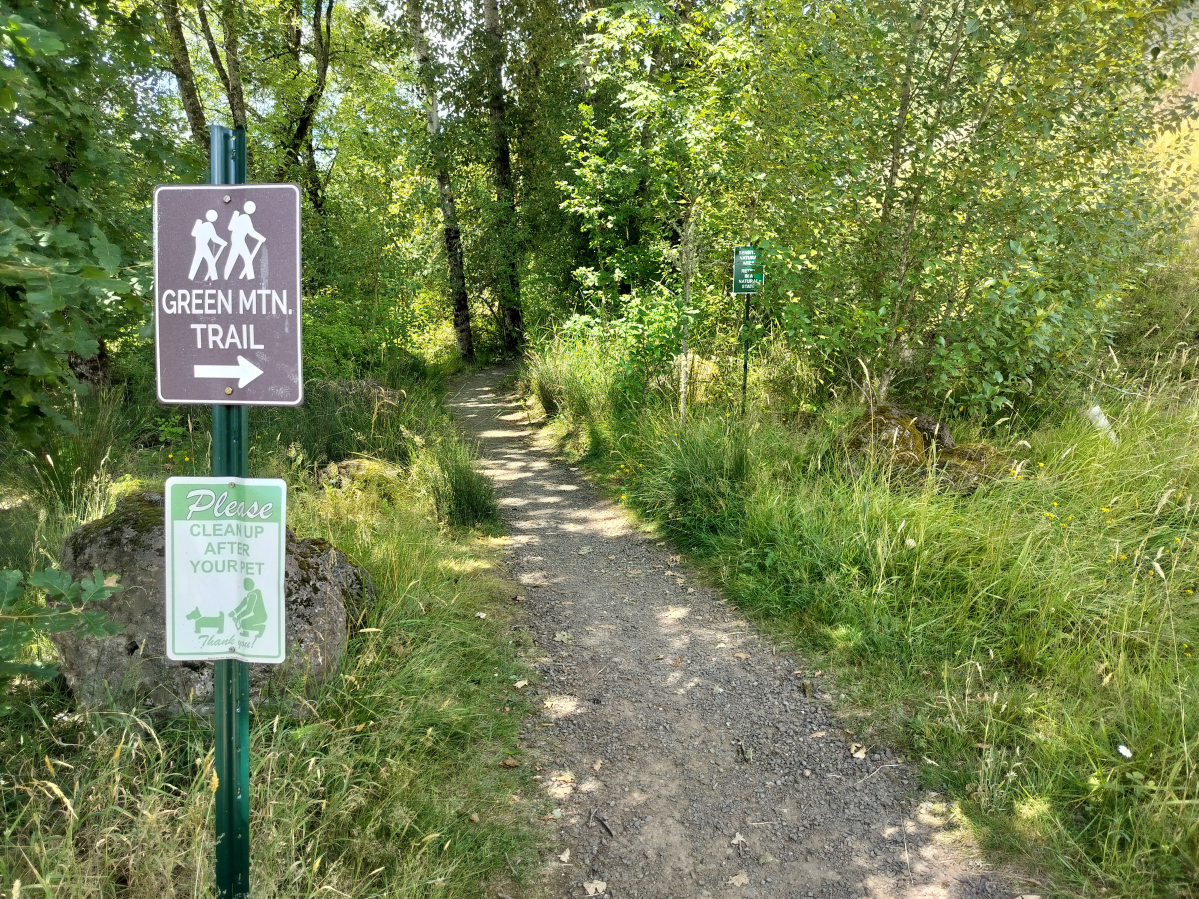 It&rsquo;s a little hard to find the Green Mountain trailhead at the northern tip of Camas. Watch out for this sign near the private swimming pool along North Boxwood Street. (Scott Hewitt/The Columbian)