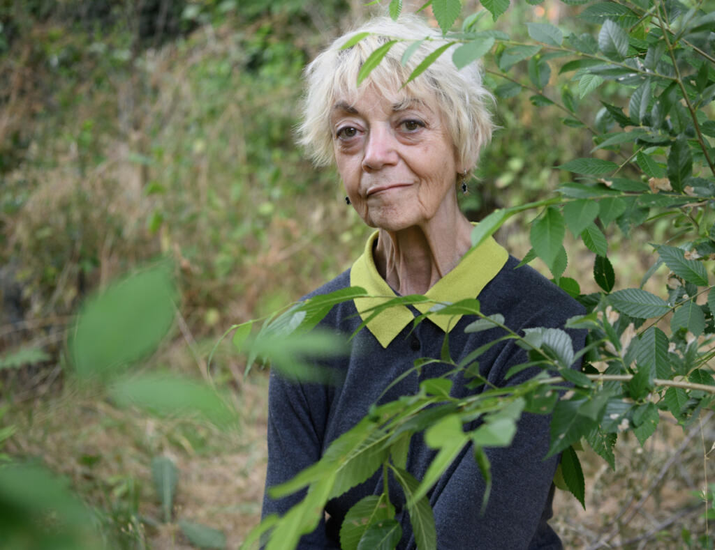 Home care aide Vicki Bickford stands for a portrait Tuesday at her home in Vancouver.