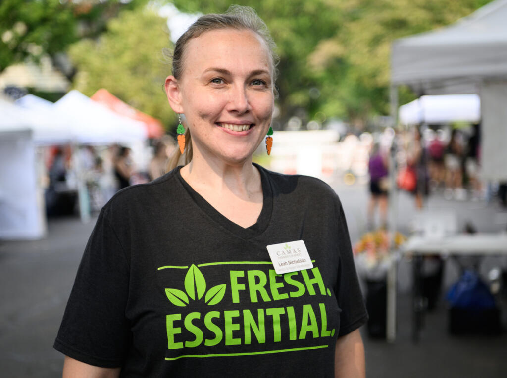 Camas Farmers Market Manager Leah Nichelson stands for a portrait Wednesday at the Camas Farmers Market. Nichelson will become the new Downtown Camas Association executive director after current director Carrie Schulstad steps down later this year. (Taylor Balkom/The Columbian)