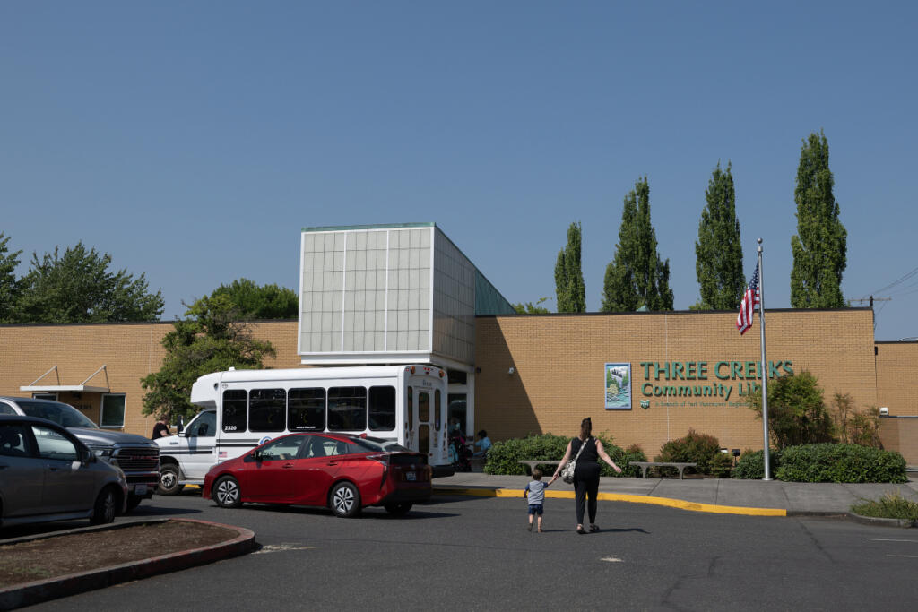 Visitors stop by Three Creeks Community Library on Tuesday morning. (Amanda Cowan/The Columbian)