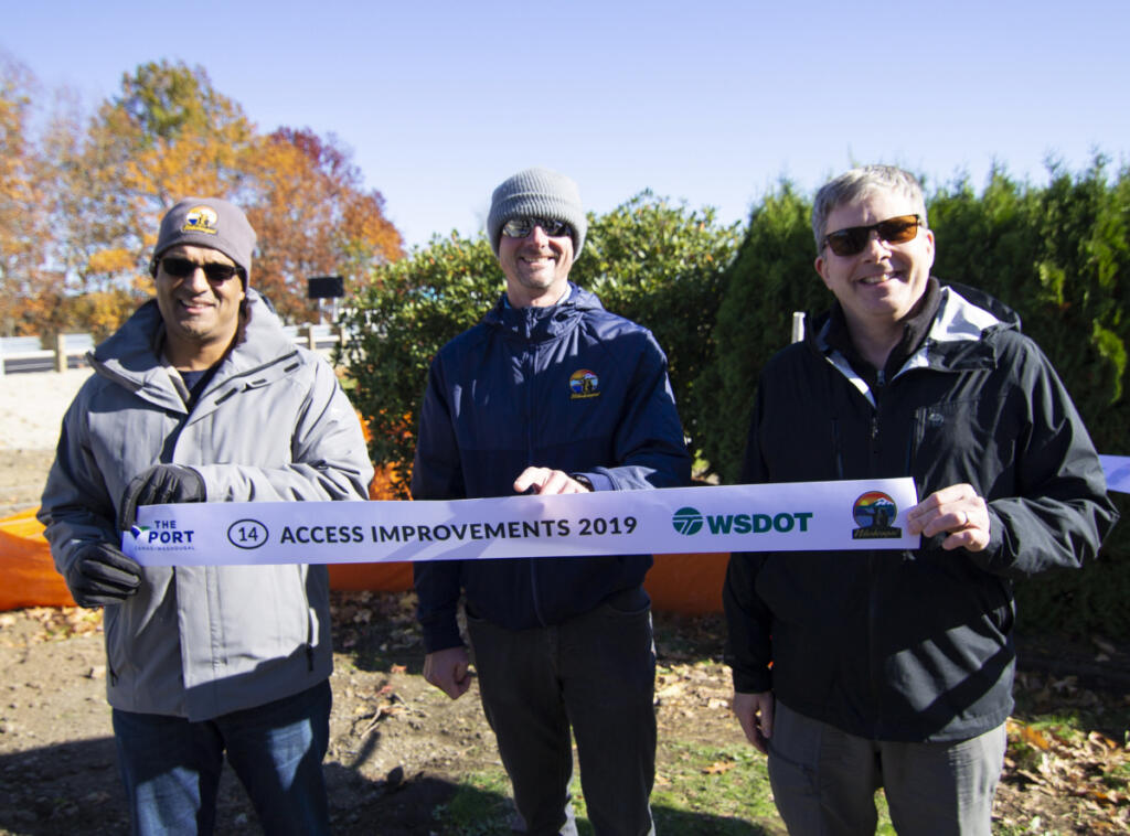 Washougal City Manager David Scott, right, celebrates the ribbon-cutting for the SR-14 Access Improvements project in 2019. (Contributed by City of Washougal)