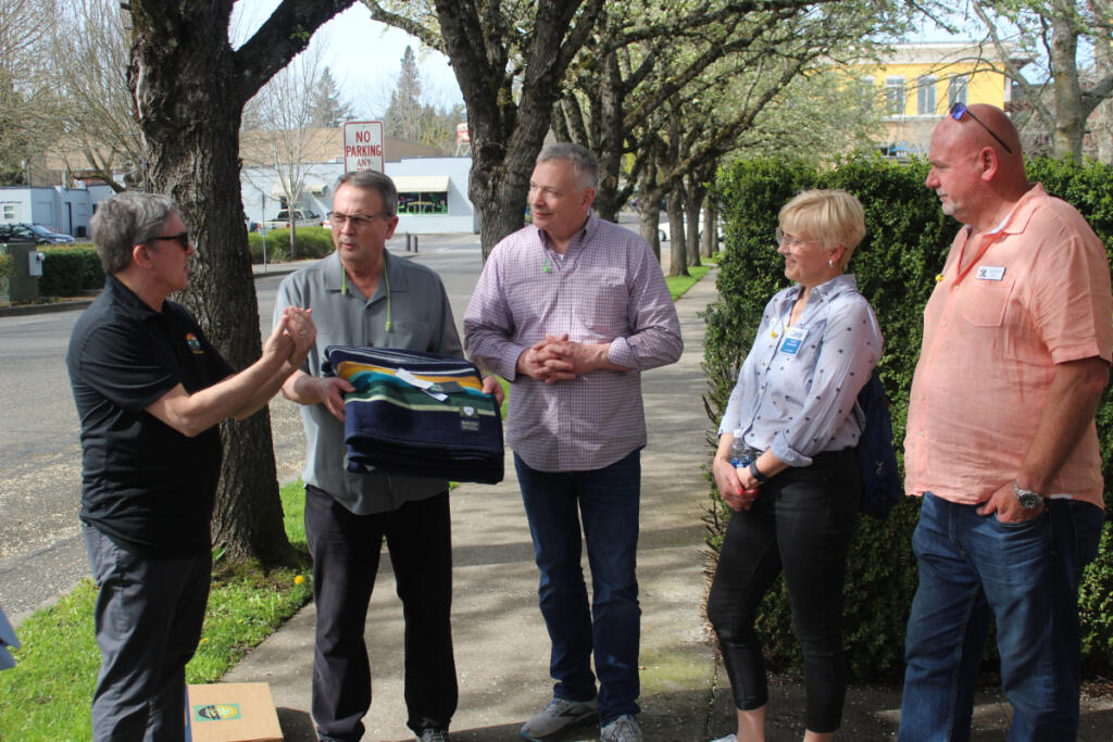 Washougal City Manager David Scott, far left, talks to Pendleton Woolen Mills employees, Polish sister city representative Roma Toft and Washougal Mayor David Stuebe during a tour of Pendleton Woolen Mills on April 26, 2023. (Contributed by City of Washougal)