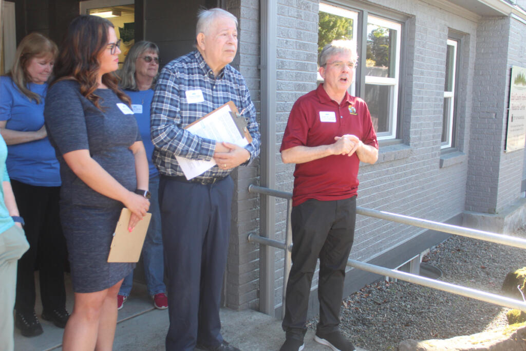 Washougal City Manager David Scott, right, speaks during a ribbon-cutting ceremony and open house on May 9, 2024, to mark the completion of renovations at the East County Family Resource Center. (Contributed by City of Washougal)