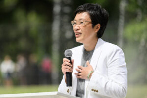 Port of Camas-Washougal Executive Director Trang Lam speaks July 2 during a ceremony reopening Crown Park in Camas. The Port of Camas-Washougal was selected by the state to receive technical assistance to implement a concept known as industrial symbiosis, which lowers cost and waste. (Taylor Balkom/ The Columbian files)