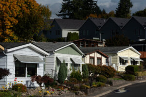 Afternoon light illuminates units at the Vista Del Rio Mobile Home Community in October. The Clark County Council is considering a new overlay zoning code that would help preserve manufactured home parks in the county&rsquo;s urban growth area. (Amanda Cowan/The Columbian files)