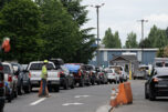 Drivers wait in line at the Central Transfer and Recycling Center in northeast Vancouver. The county council on Tuesday hired consultants to look at creating a regional solid waste utility, which could include purchasing Waste Connections Central and West Vancouver transfer stations. (Amanda Cowan/The Columbian files)