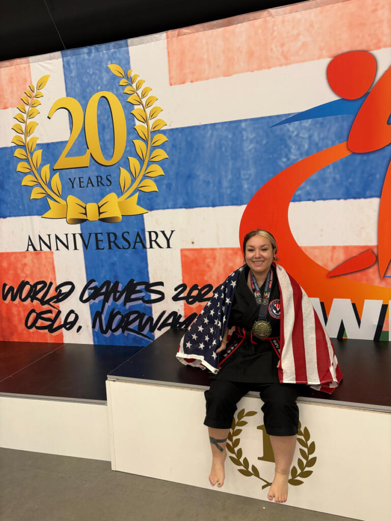 Camas resident Malia Cropper poses for a photo with her gold medal during the 2025 World Martial Arts Games in Oslo, Norway, in November. (Contributed by Desmond Diaz)