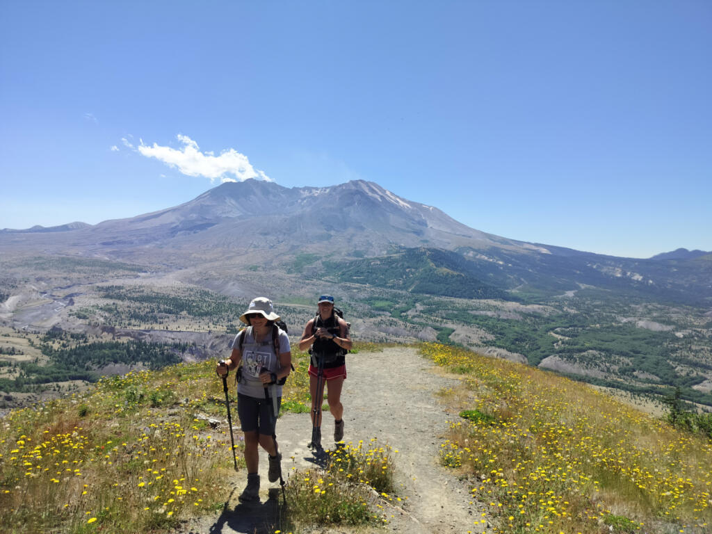 Mother-and-daughter hikers Maria and Martha Panawski of Vancouver enjoy the scenery as they ascend the Boundary Trail toward Johnston Ridge. (Scott Hewitt/The Columbian)