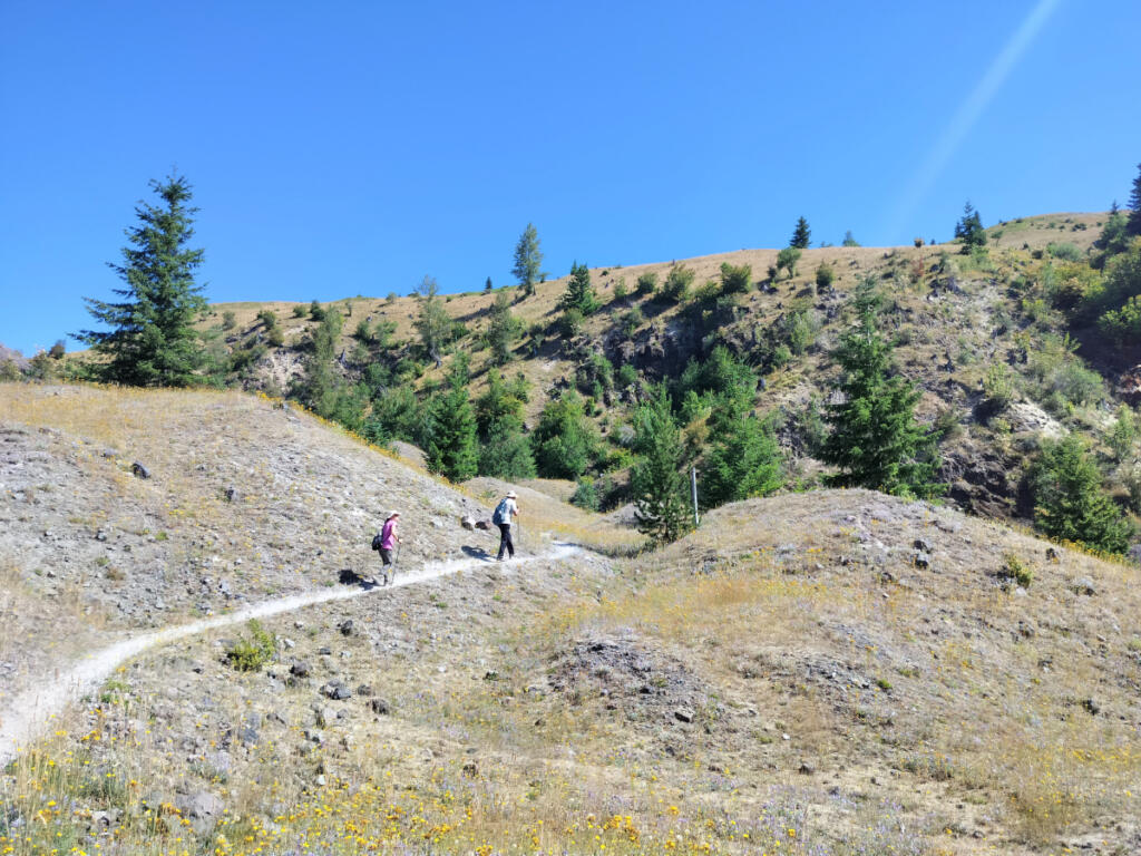 Paula and Erik Del Angel, visitors from San Antonio, Texas, ascend the trail to Johnston Ridge. (Scott Hewitt/The Columbian)