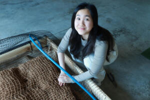 Emily Jiang, a rising Camas High School senior, designed and built a floating island &mdash; a 4-by-7-foot raft planted with native wetland species &mdash; to help combat toxic blue-green algae blooms in Fallen Leaf Lake. (Contributed by Emily Jiang)