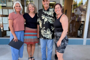 Harlan Nelson, second from right, poses for a photo with Diana Hernandez, far left, Chris O&rsquo;Hara, second from left, and Brenda Tesch, far right, at Washougal City Hall on July 27. (Photo contributed by Lynda Boesel)
