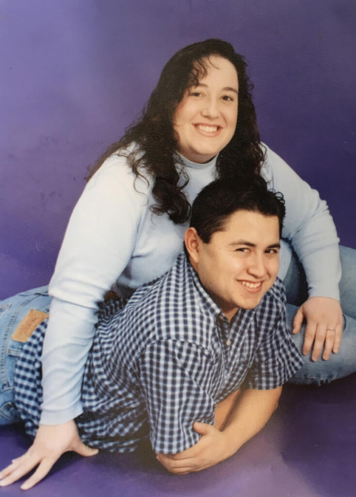 Julianne Heil, top, and Adam Heil pose for an engagement photo in 2003. (Contributed photo)
