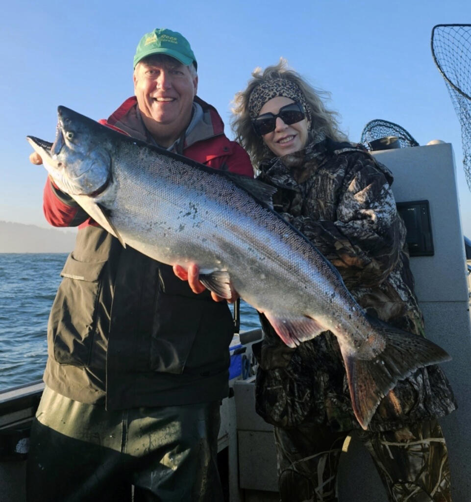 Guide Bob Rees holds a beautiful fall chinook caught by a guest of his. Rees plans on staying in the Buoy 10 fishery to target the coming coho runs. (Photo courtesy of Bob Rees)