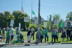 State employees line Capitol Way in Olympia to demand higher wages in their next two-year contract. (aspen ford/Washington State Standard)