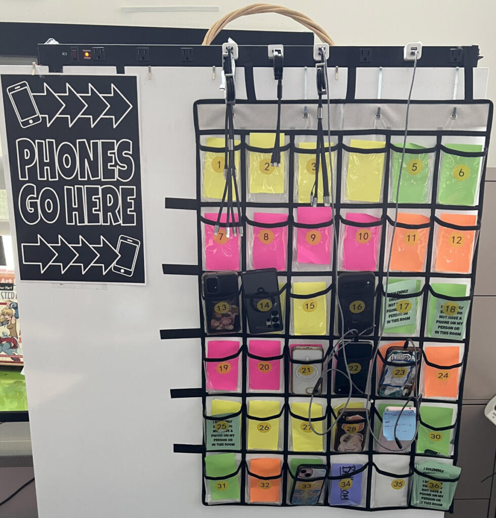 A cellphone pouch system hangs on a wall in a Discovery High School classroom Sept. 18 in Camas. (Photo contributed by Doreen McKercher)