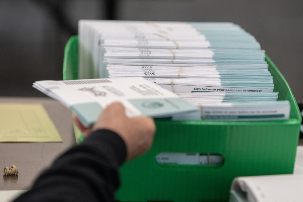 Ballots are pictured at the Clark County Elections Office on Aug. 3. (Amanda Cowan/The Columbian file photos)
