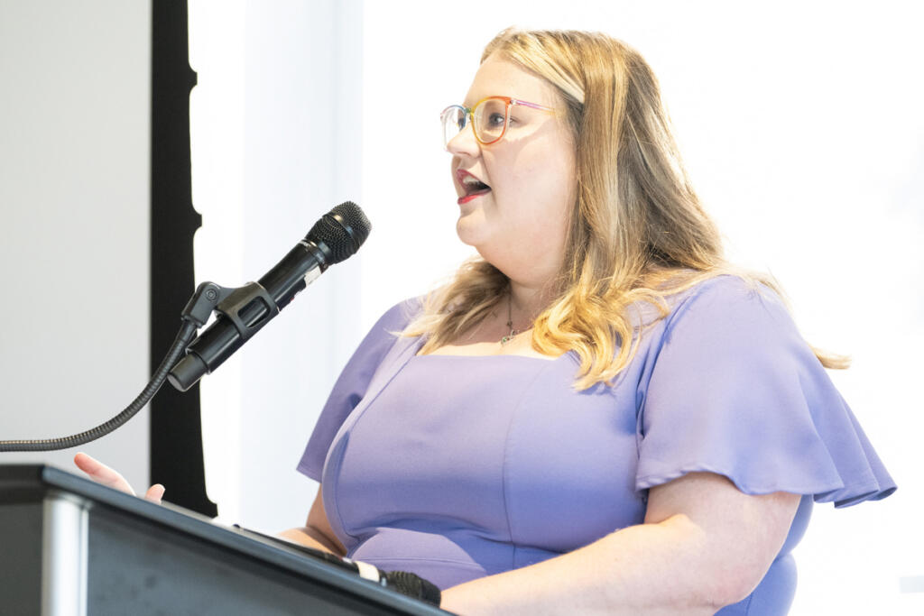 Queer Community Network founder Terah Ebie speaks Aug. 14 during a No Hate in WA State rally at Fourth Plain Community Commons. &ldquo;These initiatives were designed to divide our community and distract us from the challenges folks are facing,&rdquo; Ebie said.