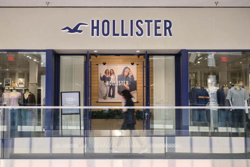 A shopper walks in front of Hollister on Tuesday at Vancouver Mall. (Photos by Taylor Balkom/The Columbian)