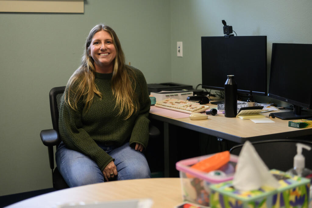 Child and family therapist Allison Traina sits for a portrait Thursday at her office in the Children&rsquo;s Center.