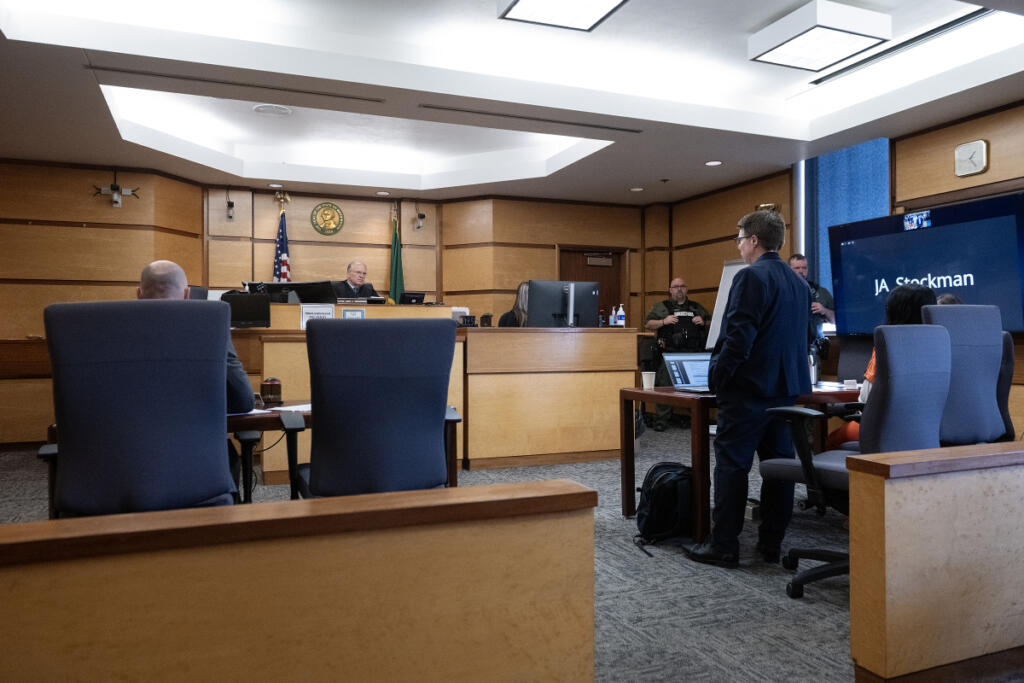 Judge David Gregerson, facing, listens during the sentencing of Helena Villa-Rodriguez in Clark County Superior Court on Wednesday afternoon. (Amanda Cowan/The Columbian)