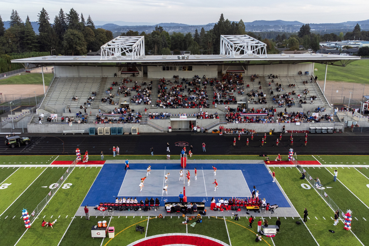 Camas and Ridgefield play in an outdoor volleyball game Friday at Doc Harris Stadium in Camas. (Taylor Balkom/The Columbian)