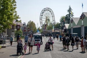 A crowd of visitors take part in opening day festivities during the annual Clark County Fair on Aug. 7. (Amanda Cowan/The Columbian files)