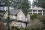 Expensive homes dot a hillside near Camas Meadows Golf Club on Feb. 18 along Lacamas Lake in Camas. More high-income earners have moved out of the county than into it since the COVID-19 pandemic. (Taylor Balkom/The Columbian files)