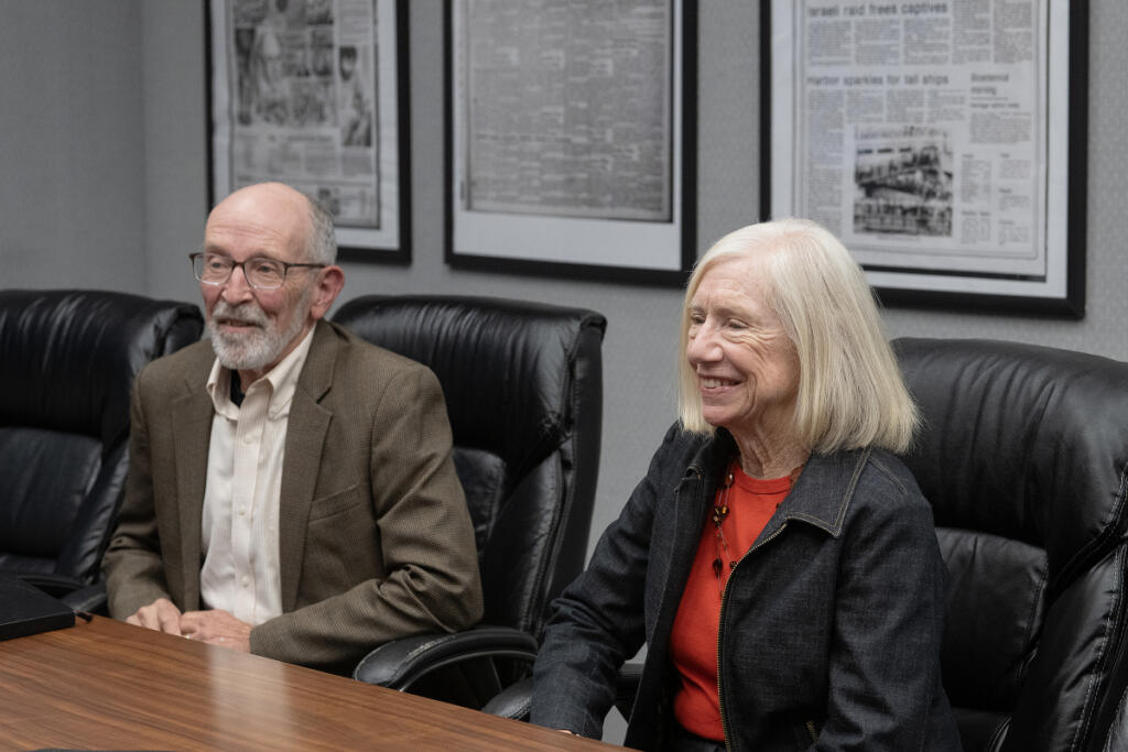Clark Public Utilities board of commissioners candidates Gordon Matthews, left, and Jane Van Dyke meet with The Columbian&rsquo;s Editorial Board on Thursday afternoon. (Amanda Cowan/ The Columbian)