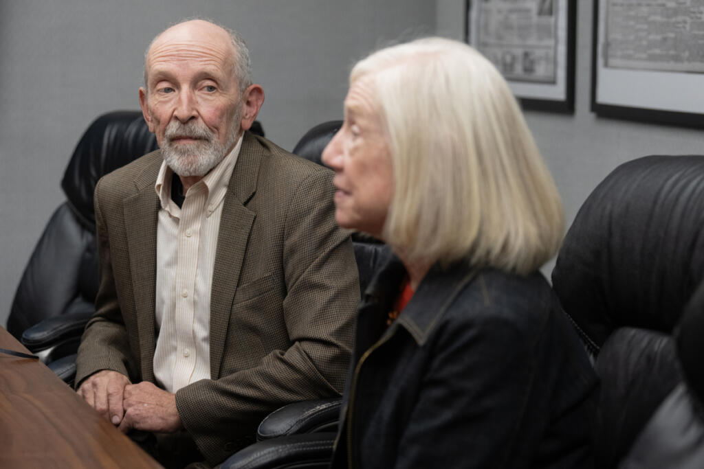 Clark Public Utilities board of commissioners candidates Gordon Matthews, left, and Jane Van Dyke meet with The Columbian&rsquo;s Editorial Board on Thursday afternoon. (Amanda Cowan/The Columbian)