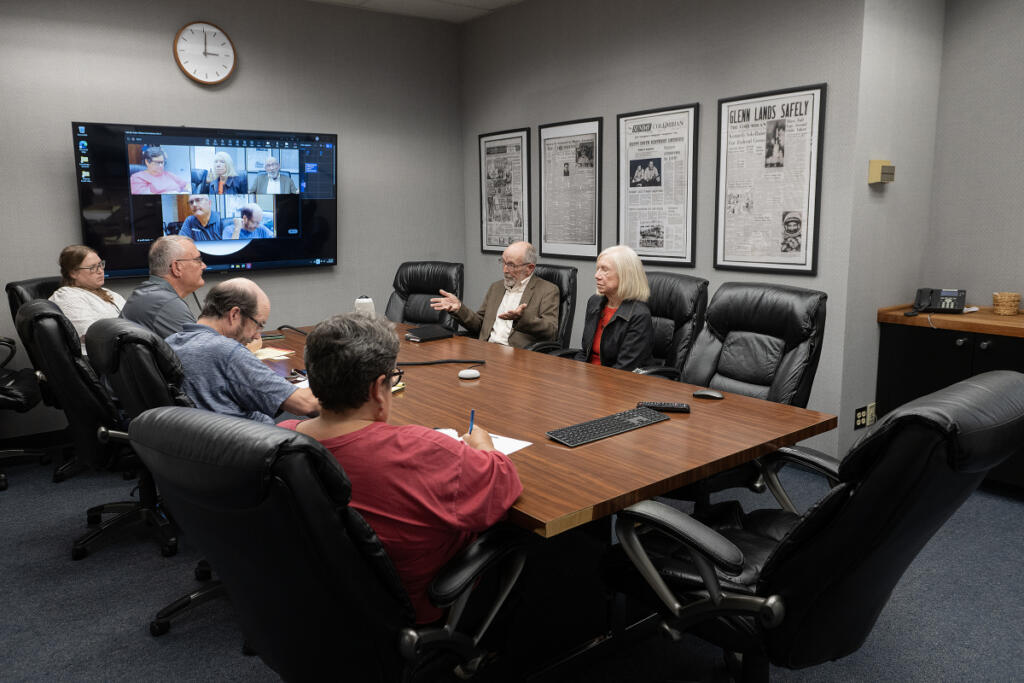 Clark Public Utilities board of commissioners candidates Gordon Matthews, second from right, and Jane Van Dyke, right, meet with The Columbian&rsquo;s Editorial Board on Thursday afternoon. (Amanda Cowan/The Columbian)