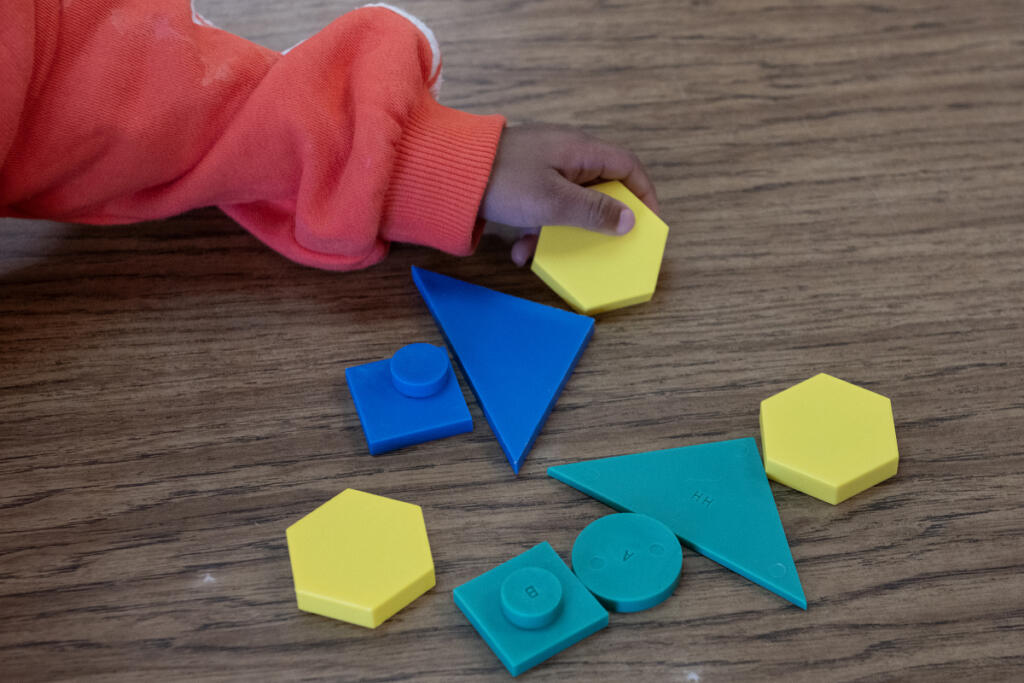 A youngster gets practice with shapes during playtime at Battle Ground Early Learning Center on Monday morning. Educational Opportunities for Children and Families&rsquo; leaders are sounding the alarm about proposed changes to Head Start. (Amanda Cowan/The Columbian)