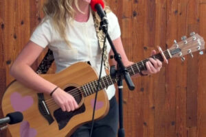 Camas resident Jette Bigelow performs her song &ldquo;Roll Your Eyes&rdquo; during a recital at the Camas Community Center on Sept. 26. (Megan Bigelow)