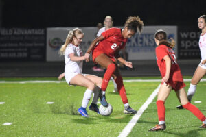 Camas junior Kaliyah Salley (22) challenges Union freshman Keira Moore, left, for the ball during a 4A Greater St. Helens League match Tuesday at Doc Harris Stadium in Camas. Salley scored two goals in the Papermakers&rsquo; 3-0 win. (Tim Martinez/The Columbian)