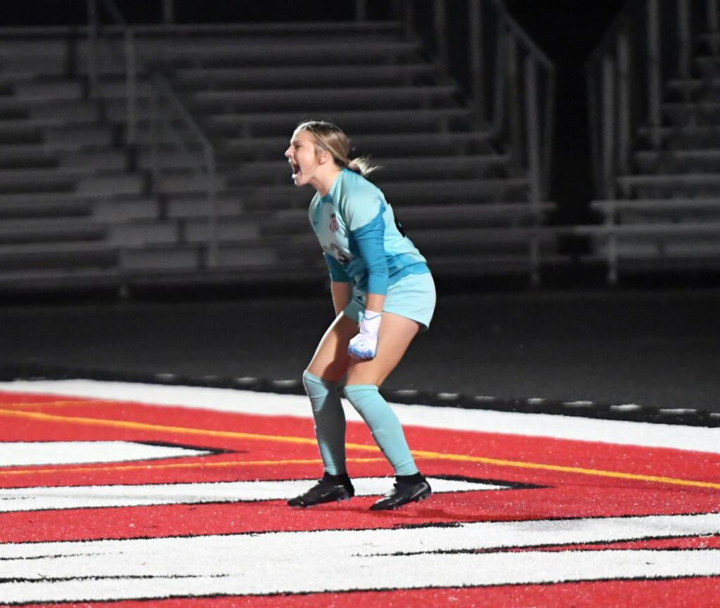 Camas freshman goalkeeper Sam Baldwin celebrates after coming up with a save on a penalty kick by Union on Tuesday. Baldwin (Tim Martinez/The Columbian)