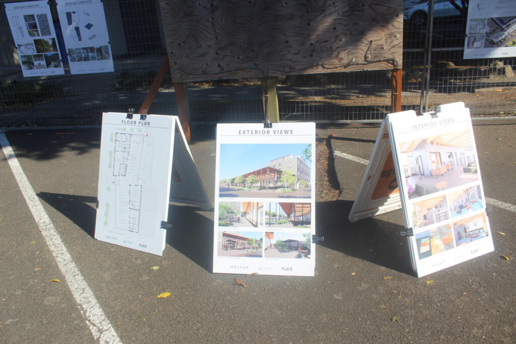 Design renderings are posted at Thursday&rsquo;s groundbreaking ceremony for FVRLibraries&rsquo; new Washougal library. (Doug Flanagan/The Columbian)