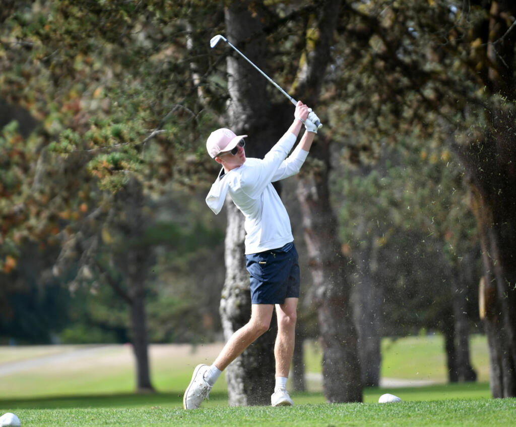 Graham Vilhauer of Skyview hits a tee shot on the No. 11 hole at Lewis River Golf Club during the 4A Greater St. Helens League boys golf district tournament. Vilhauer finished runner-up to Ryker Jun of Camas. (Tim Martinez/The Columbian)