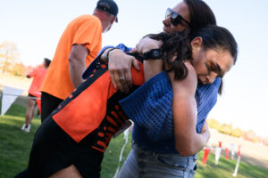 Battle Ground senior Sophia Rogers embraces her mom Kelly Rogers after Sophia won the girls race Wednesday, Oct. 1, 2026, during the 4A GSHL District Meet at UL Campus in Camas. (Taylor Balkom/The Columbian)