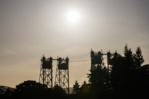 The sun sets above the Interstate 5 Bridge on Friday, seen from Fort Vancouver National Historic Site. Super El Ni&ntilde;o conditions are expected  to affect fall and winter weather (Taylor Balkom/ The Columbian)