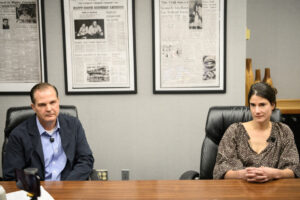 Republican challenger Jon Braun, left, and U.S. Rep. Marie Gluesenkamp Perez, D-Skamania, listen to a question Oct. 5 during a Columbian Editorial Board interview at The Columbian in Vancouver. (Taylor Balkom/The Columbian)